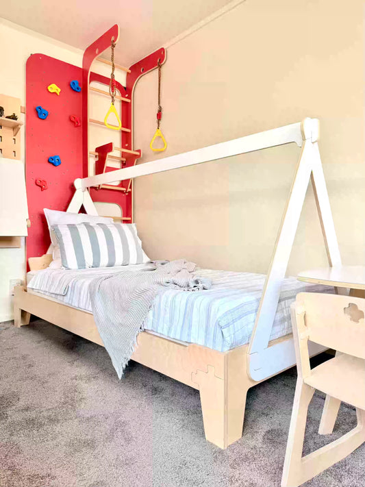 Child’s bedroom with a flippable floor bed and minimal soft toys to help reduce dust build-up