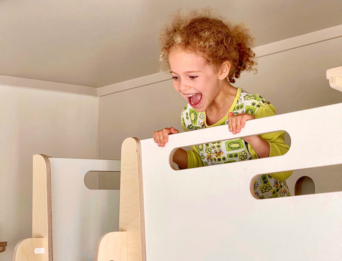 A bright kids’ room with a bunk bed and study desk made from natural wood — KitSmart children’s furniture Australia