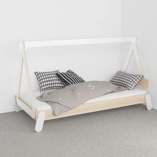 Calm children’s bedroom with a canopy Montessori bed and simple natural furniture