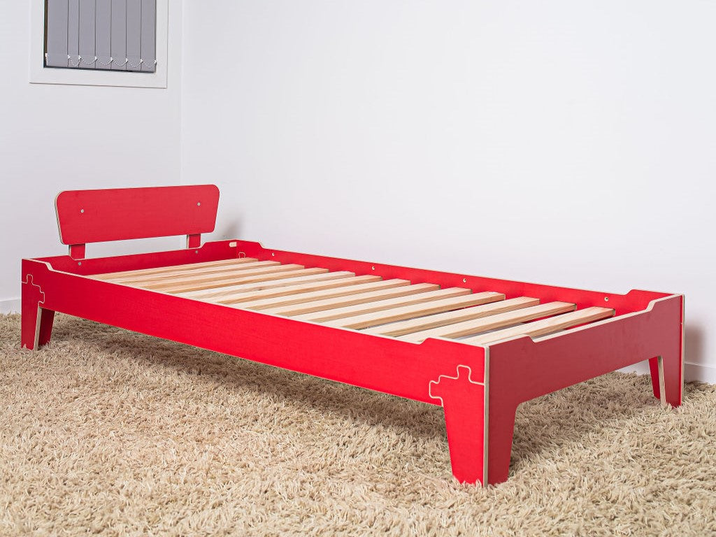 Convertible birch plywood floor bed for growing kids — flips from toddler to standard height